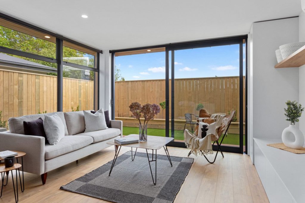 Living Area with large windows and modern furniture, Christchurch. Built by R&B Build